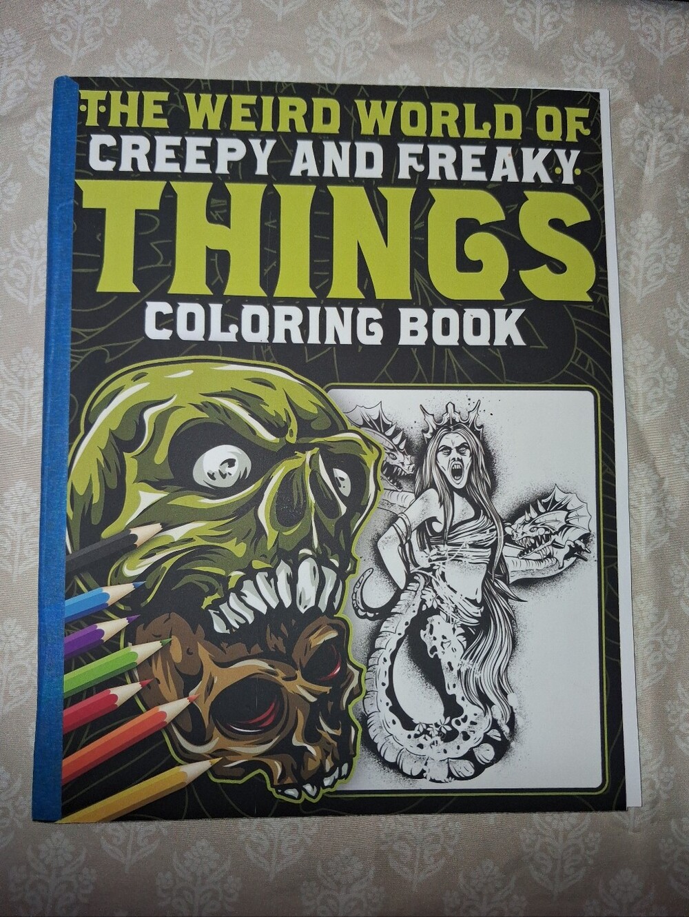 The Weird World Of Creepy And Freaky Things Coloring Book